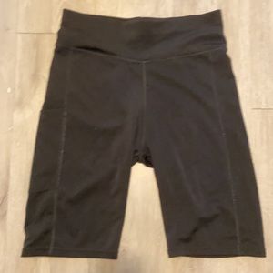 Plain black biker shorts. Only worn a couple times, longer length.